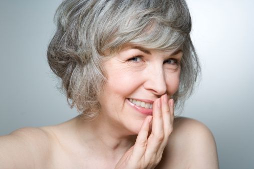 Mature woman smiling, close-up